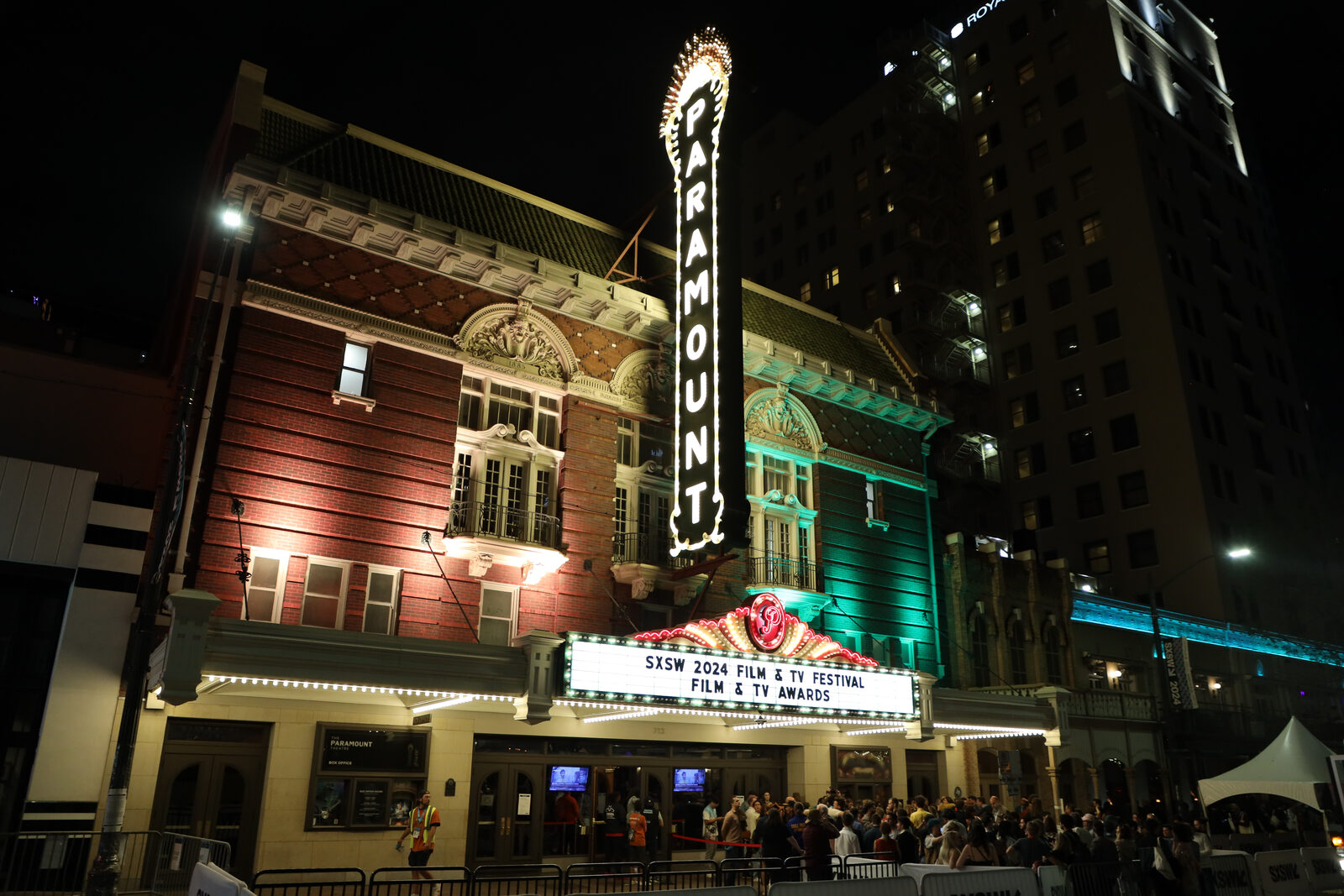 The historic Paramount Theatre lit up at night on Congress Avenue in Austin